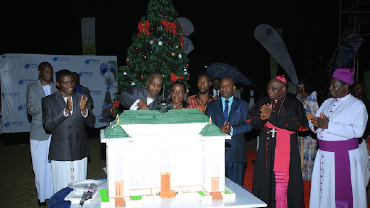 Prince Herbert Kateregga cutting the cake at the ceremony in Bulange